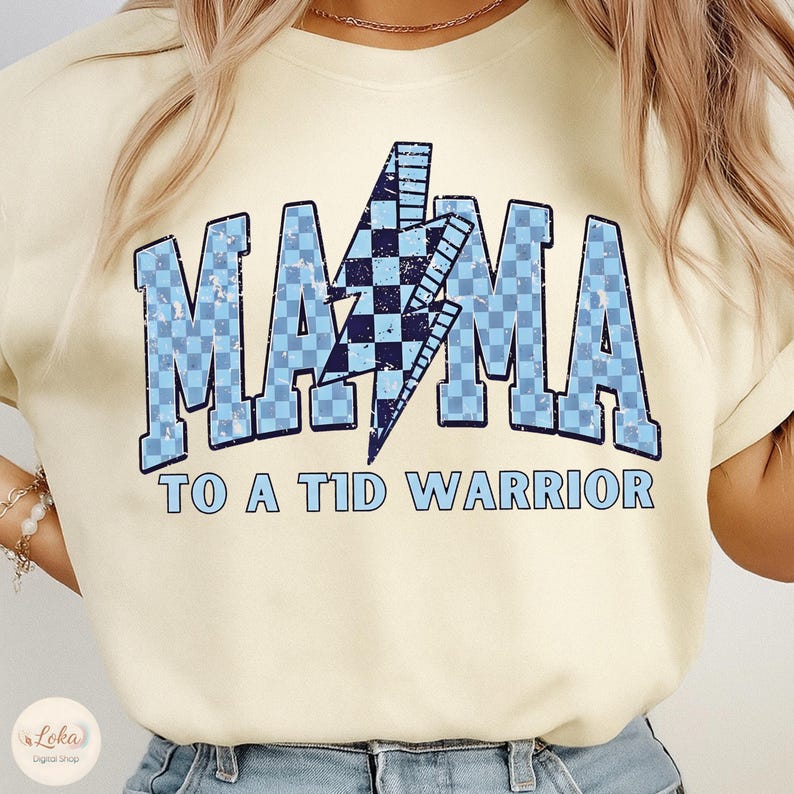 Retro Diabetes Awareness PNG design featuring “Mama to a T1D Warrior” text with blue ribbon, vintage style Type 1 Diabetes mom graphic for November awareness and support