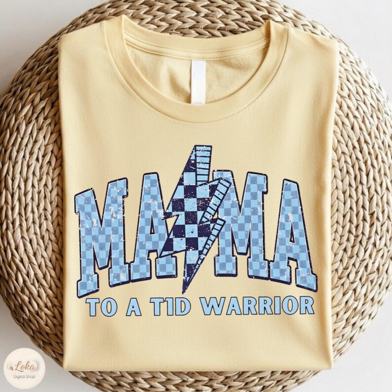 Retro Diabetes Awareness PNG design featuring “Mama to a T1D Warrior” text with blue ribbon, vintage style Type 1 Diabetes mom graphic for November awareness and support