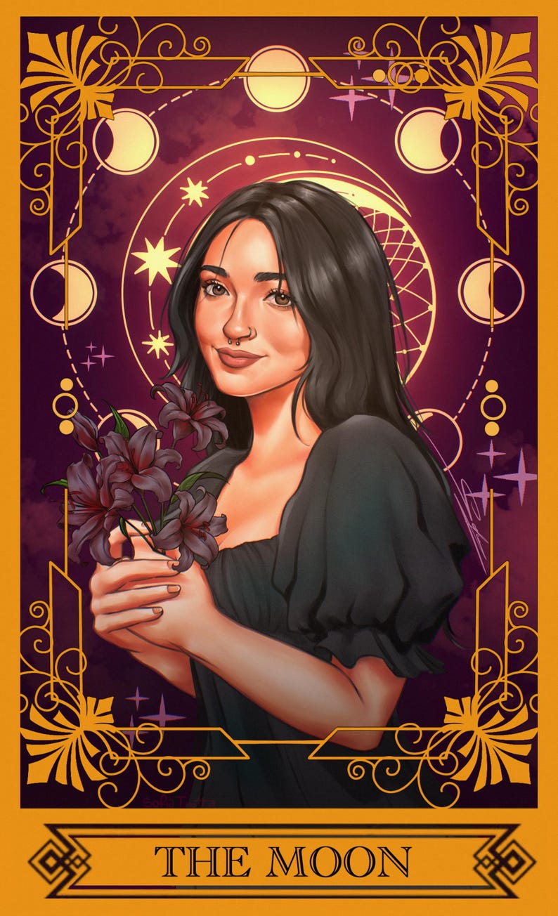 May include: A digital illustration of a person with dark hair holding dark purple lilies, framed by a gold border with moon phase icons and stars. The text THE MOON is centered at the bottom against a deep purple background with gold accents.