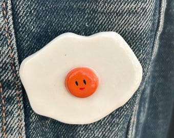 Handmade Ceramic fried egg Brooch.