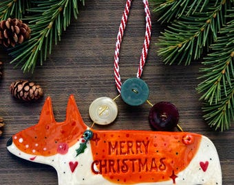 Handmade Ceramic Corgi Decoration with Merry Christmas and vintage buttons.