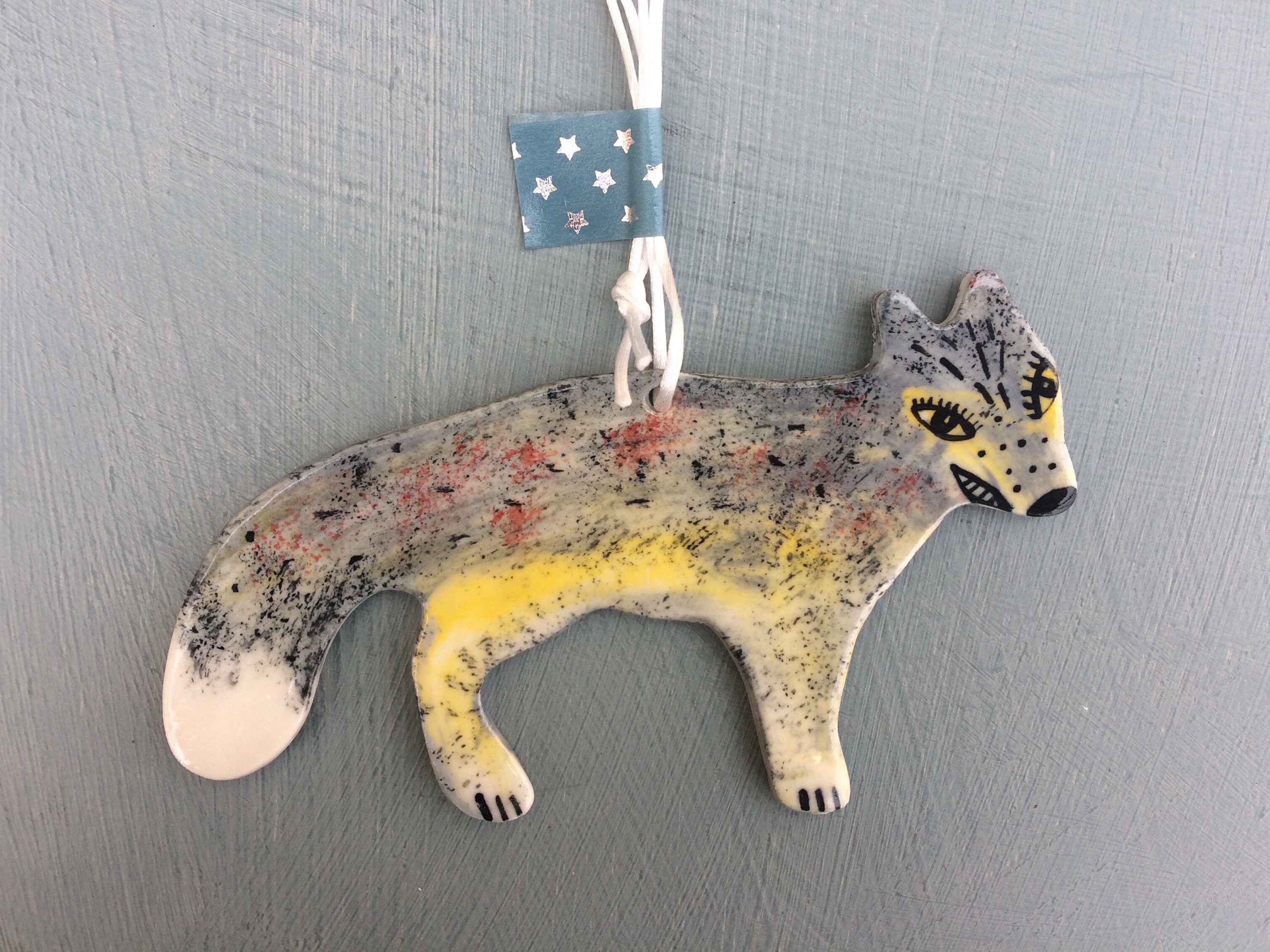 ceramic wolf statue
