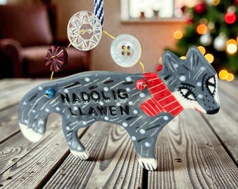 Handmade Ceramic Christmas Wolf Decoration with vintage buttons.Welsh Nadolig Llawen and Merry Christmas message.