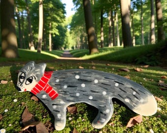 Handmade Ceramic Winter Wolf Brooch.