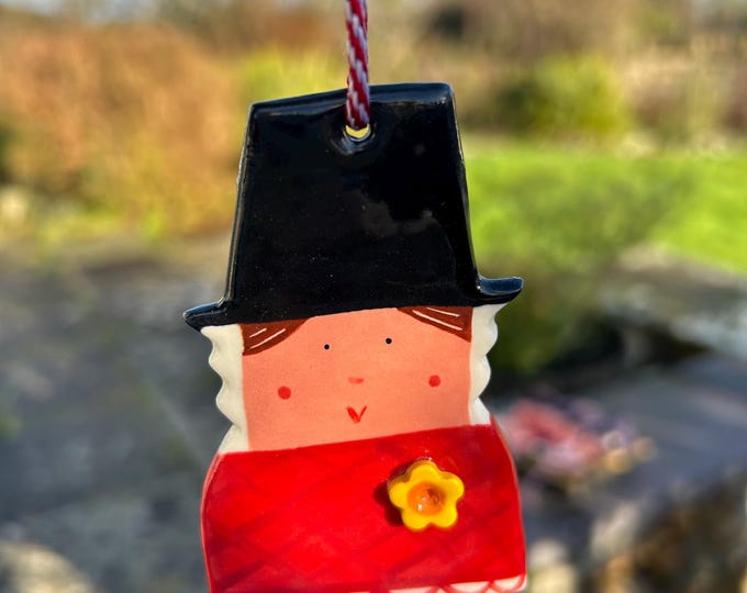 Featured listing image: Ceramic Welsh Lady hanging Decoration.