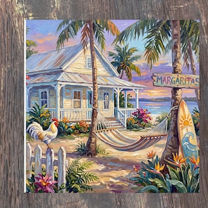 May include: A vibrant oil painting of a coastal cottage with a white picket fence, a rooster, and a hammock strung between palm trees. A wooden sign reads MARGARITAS, and a surfboard with a sun and wave design leans against a palm tree.