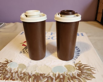 70's tupperware salt and pepper shakers. Brown and cream.