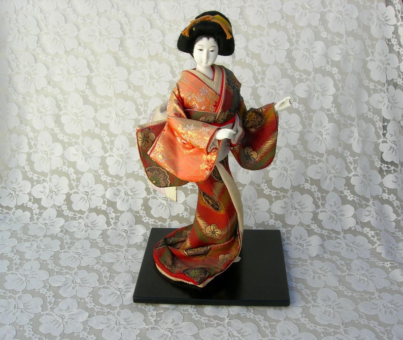 porcelain geisha doll