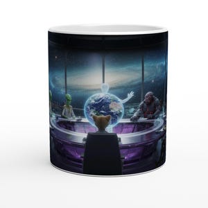 May include: White ceramic coffee mug featuring a humorous illustration of a meeting of aliens, a zombie, and a cat-like creature around a globe. The background shows a starry galaxy through a large window. The mug has a black and white design.