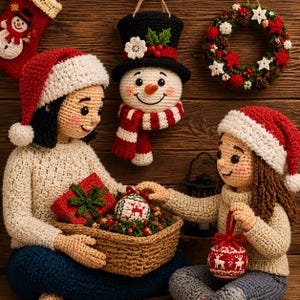 May include: Two crocheted dolls wearing Santa hats and cream sweaters, one holding a basket with a red gift and a patterned ornament, the other holding a red ornament. A crocheted snowman head, a stocking, and a wreath hang in the background.