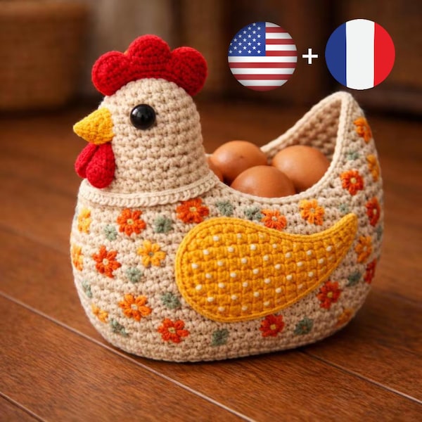 May include: A handmade crochet chicken-shaped egg basket. The basket is beige with orange, yellow, and green floral accents. It has a red comb and wattle, a yellow beak, and a black eye. The basket is filled with brown eggs.