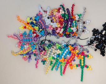 wings of fire themed beaded lizards- icewings, leafwings, and rainwings