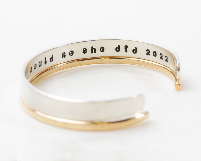 Handmade inspirational graduate gift cuff set. Hand stamped with the expression she believed she could so she did on the inside, outside is hand hammered. Wider cuff is silver and thinner cuff is nu gold. Best graduation gift or encouragement gift.