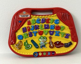 Juguete educativo de aprendizaje fonético Leapfrog Letter Band