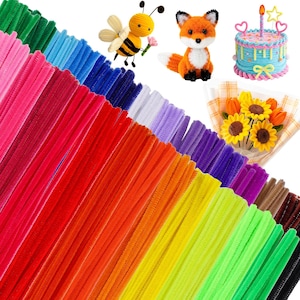 May include: A collection of colorful pipe cleaners in various shades, including green, blue, pink, red, orange, yellow, and brown. The image also features handmade craft items: a bee, a fox, a cake, and a bouquet of flowers, all made from craft materials.