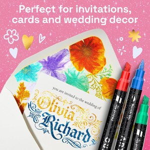 May include: An envelope with a floral-patterned liner, a white invitation card with the text "you are invited to the wedding of Olivia Richard" in gold and blue, and three markers with red, blue, and green tips and black glittery barrels.