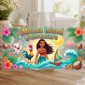 May include: A clear glass tumbler featuring a colorful Moana Island Adventure graphic. The design includes Moana, Pua the pig, Heihei the rooster, a sailboat, tropical hibiscus flowers, palm leaves, seashells, coconuts, and a bright sun.