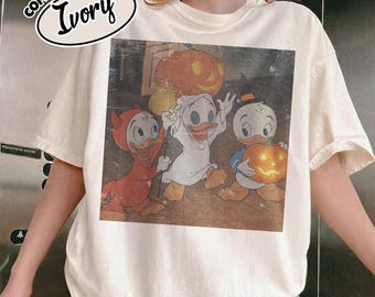 Camiseta Comfort Color Vintage Donald Disney Halloween, Camiseta Disney Halloween, Camiseta Disney World, Camisetas para fiesta familiar de Halloween 2026 RLVF33