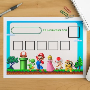 以下が含まれることがあります： スーパーマリオのビデオゲームシリーズのキャラクターが登場するカラフルな報酬チャート。チャートは青いボーダーで、「IS WORKING FOR」のテキストと進捗状況を追跡するための空白のボックスがいくつかあります。ペン、ペーパークリップ、マウスも表示されています。