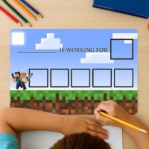 May include: A Minecraft-themed reward chart with a blue sky background and pixelated grass. The chart includes the text "IS WORKING FOR" and several blank boxes. Pencils and watercolour paints are visible.