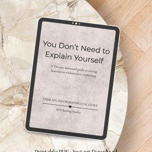 May include: A digital guide titled "You Don't Need to Explain Yourself" on a tablet. The guide is a therapy-informed resource for setting boundaries. The tablet is on a marble-patterned surface. The text "Printable PDF • Instant Download" is at the bottom.