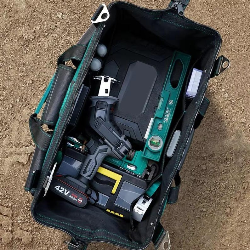 20'' Heavy-Duty Open Top Tool Bag – 25 Pockets, Stainless Steel Handle, Shoulder Strap, 1680D Oxford Fabric, Foldable – Black/Green, For Electricians & Contractors