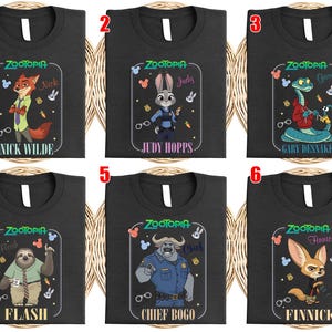 Puede incluir: Camisetas negras con personajes de la pel&iacute;cula animada "Zootopia". Cada camiseta muestra un personaje diferente: Nick Wilde, Judy Hopps, Gary, Flash, Chief Bogo y Finnick, con sus nombres debajo. Las camisetas tienen cuello blanco.