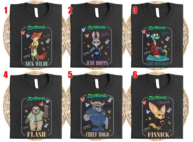Puede incluir: Camisetas negras con personajes de la pel&iacute;cula animada "Zootopia". Cada camiseta muestra un personaje diferente: Nick Wilde, Judy Hopps, Gary, Flash, Chief Bogo y Finnick, con sus nombres debajo. Las camisetas tienen cuello blanco.