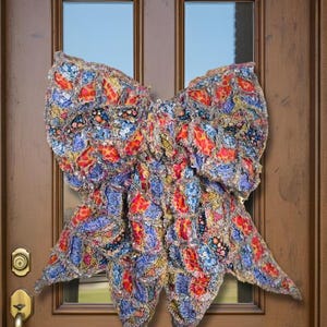 May include: A set of three ceramic mugs with a speckled, matte finish. The mugs are in shades of cream, light gray, and dark gray. Each mug has a simple, minimalist design, perfect for coffee or tea.