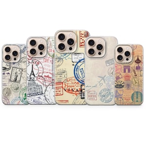May include: Five phone cases with travel-themed designs. Each case features a different vintage passport stamp design, including stamps from Paris, Tokyo, and Australia. The cases are in various shades of beige, red, and blue.