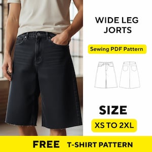Op de afbeelding: Zwarte denim wide-leg jorts. De afbeelding bevat de tekst "WIDE LEG JORTS", "Sewing PDF Pattern", "SIZE XS TO 2XL" en "FREE T-SHIRT PATTERN". De jorts hebben een rafelige zoom en zakken. Het model draagt een lichtgekleurd T-shirt.