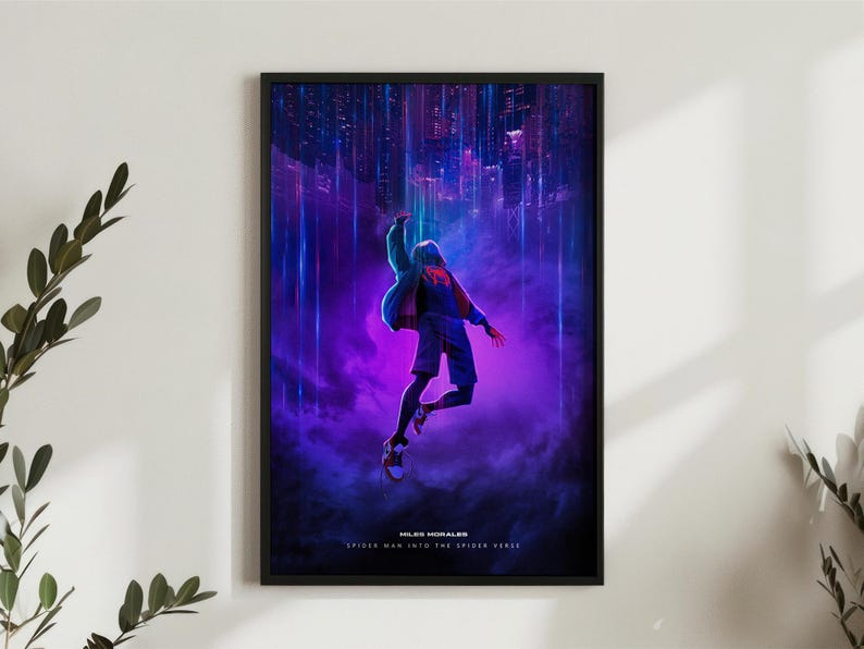 May include: Framed poster featuring Miles Morales from Spider-Man: Into the Spider-Verse. The artwork depicts the character mid-air against a vibrant purple and blue cityscape background. The poster has a black frame and includes the movie title.