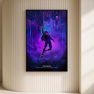 May include: A framed poster featuring a dynamic illustration from "Spider-Man: Into the Spider-Verse." The artwork depicts a figure in mid-air against a vibrant, purple and blue cityscape backdrop. The poster is displayed on a beige wall.