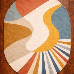 Puede incluir: Alfombra ovalada con diseño retro. La alfombra presenta una paleta de colores naranja, amarillo, azul y beige. El diseño incluye líneas curvas y formas geométricas, creando un patrón abstracto moderno.