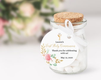 Könnte beinhalten: Ein weißer runder Geschenkanhänger mit goldenem Blumendesign und einem goldenen Kelch-Symbol. Der Anhänger trägt den Text "Lauren's First Holy Communion" und "Vielen Dank, dass Sie mit uns gefeiert haben! 12. Mai 2020".
