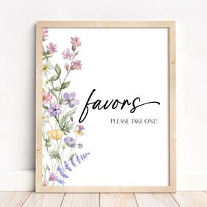 May include: A printable sign with a watercolor floral border and the text "favors please take one!" in black script font.