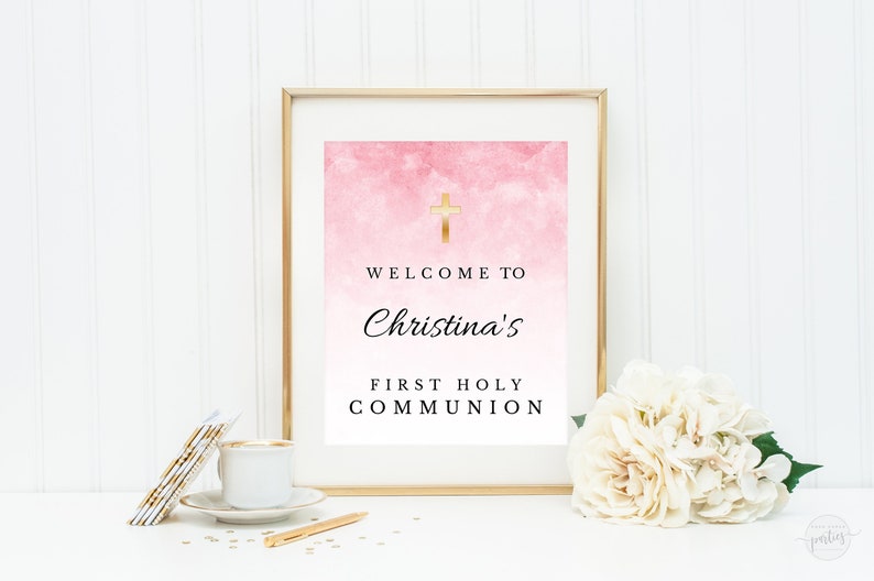 May include: A pink and white watercolor background with a gold cross and the text "Welcome to Christina's First Holy Communion".