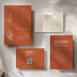 May include: A wedding stationery set featuring a large rust-colored invitation with the text Hazel + Finn, a cream-colored RSVP card, a rust-colored response card with a QR code, and a rust-colored wedding details card, all with white serif typography.