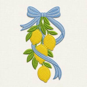 May include: Embroidered design featuring yellow lemons, green leaves, and a light blue ribbon tied in a bow. The design is on a white background. The lemons are detailed with textured stitching.