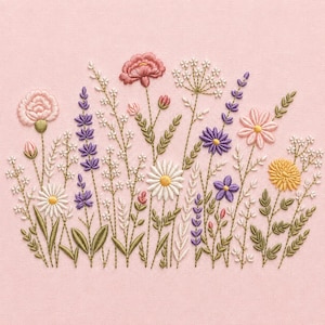 May include: A textile piece featuring detailed embroidery of a wildflower meadow on a solid light pink fabric background. The design includes various floral stems in shades of pink, purple, white, and yellow, with green leaves and stems.