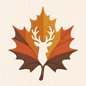 Peut inclure: Une broderie en forme de feuille d'érable présentant la silhouette en espace négatif d'une tête de cerf avec des bois. La feuille est divisée en sections de fils jaune doré, orange brûlé et brun foncé, créant un motif texturé automnal.