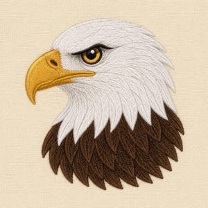 May include: An embroidered patch featuring the head of a bald eagle in profile. The eagle has a bright yellow hooked beak, a piercing yellow eye with a black pupil, white feathers on the head, and dark brown feathers on the neck area.