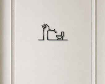 May include: A black wall-mounted sign featuring a minimalist line art illustration of a figure standing next to a toilet. The design is composed of thin, continuous black lines that form the silhouette of the person and the toilet fixture.
