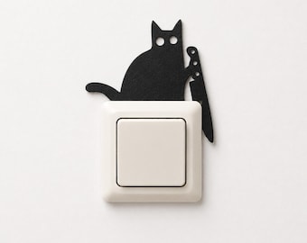 Cat light switch decoration | Cat wall decoration for a light switch or socket | Funny cat with a knife