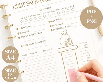 May include: A spiral-bound debt snowball tracker with gold accents. The beige pages feature prompts for tracking debt, with the text "DEBT SNOWBALL TRACKER." Includes size options: A4 and US 8.5" x 11". A hand is shown using a pink pen.