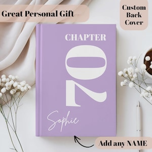 May include: A lavender hardcover book featuring the word CHAPTER in white text above a large white number 70. The name Sophie is printed in white script below the number. The cover includes the text Great Personal Gift and Custom Back Cover.