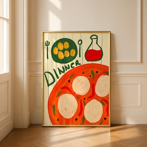 May include: A framed art print featuring a colorful, abstract illustration of a dinner scene. The artwork includes a pizza, a plate of olives, a bottle of red liquid, and the word "DINNER". The color palette includes orange, green, and red.