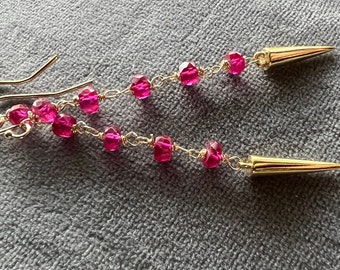 Gold dagger and red spinel drop earrings