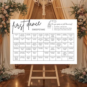 May include: A white "First Dance Sweepstake" game board on an easel, with a floral and draped fabric backdrop. The board features a grid of song choices and instructions: "Can you guess our first dance song?"