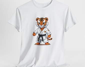 May include: White t-shirt featuring a cartoon tiger wearing a karate uniform with a black belt. The tiger has orange and black stripes and is standing in a martial arts pose. The shirt is made of a soft, comfortable material.